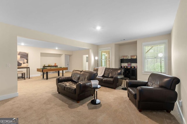 4457 Equity Ct, Ellenwood, GA 30294 - living area featuring light colored carpet, plenty of natural light, recessed lighting, and baseboards