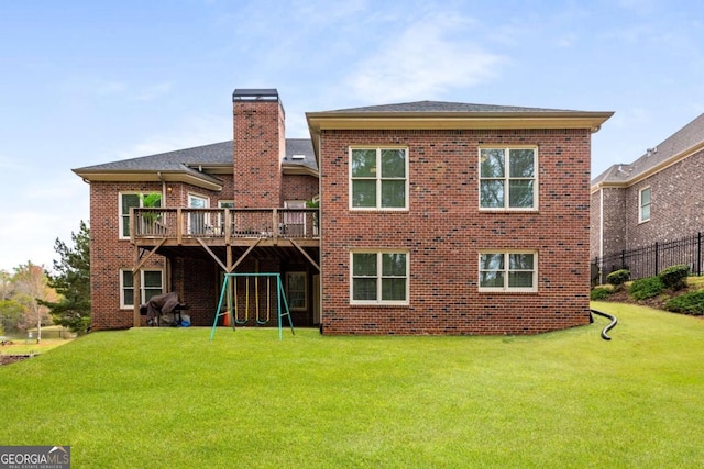 4457 Equity Ct, Ellenwood, GA 30294 - back of property featuring brick siding, a wooden deck, and a chimney