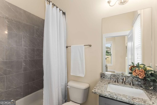 4457 Equity Ct, Ellenwood, GA 30294 - bathroom featuring toilet, vanity, and shower / bathtub combination with curtain