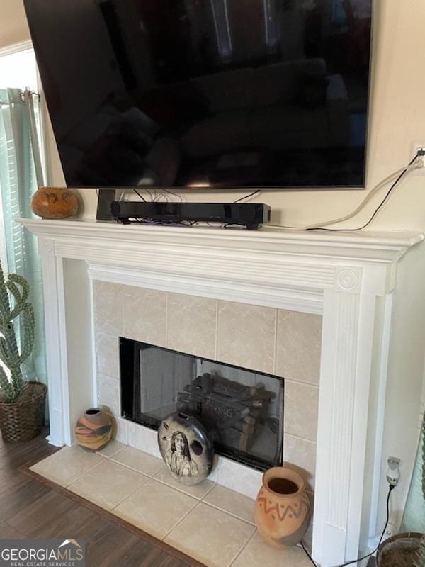 3955 Sweetwater Pkwy, Ellenwood, GA 30294 - detailed view of a fireplace and wood finished floors