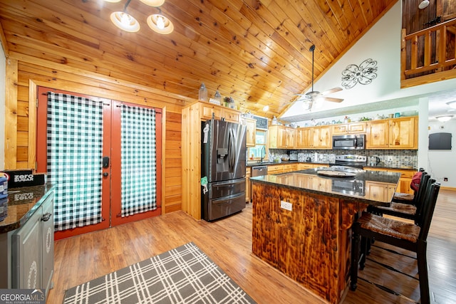 149 Savior Ln, Hamilton, GA 31811 - kitchen with appliances with stainless steel finishes, a center island, high vaulted ceiling, wooden ceiling, and light wood-type flooring