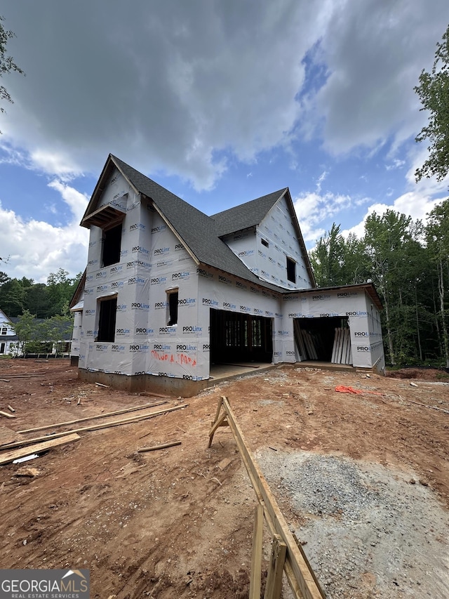385 Snead Rd, Fayetteville, GA 30215 - view of side of home with a garage
