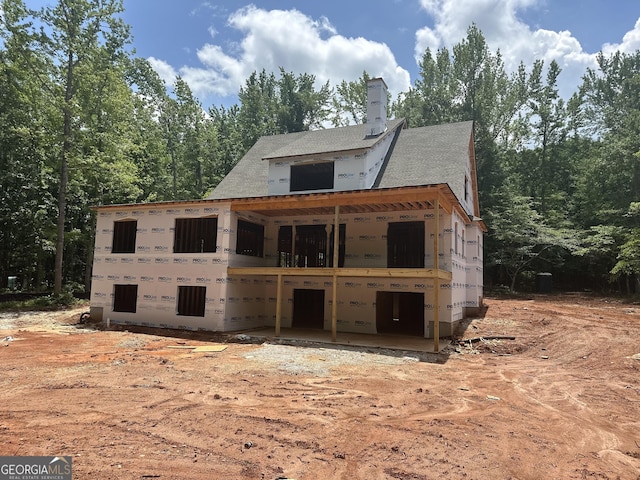 385 Snead Rd, Fayetteville, GA 30215 - view of front of home with a chimney and a shingled roof