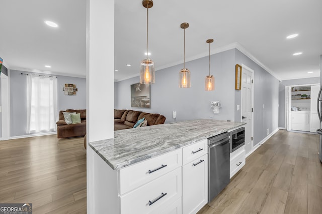 557 Spring Creek Way NE, Marietta, GA 30068 - kitchen featuring ornamental molding, appliances with stainless steel finishes, recessed lighting, light wood finished floors, and light stone counters