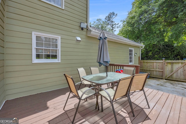 557 Spring Creek Way NE, Marietta, GA 30068 - wooden deck with outdoor dining area