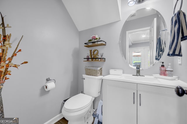 557 Spring Creek Way NE, Marietta, GA 30068 - half bathroom featuring toilet, vanity, and wood finished floors