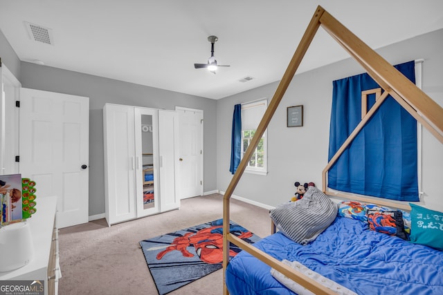 557 Spring Creek Way NE, Marietta, GA 30068 - bedroom with carpet floors, baseboards, and a ceiling fan