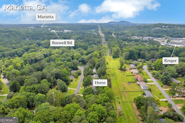557 Spring Creek Way NE, Marietta, GA 30068 - aerial view of a heavily wooded area