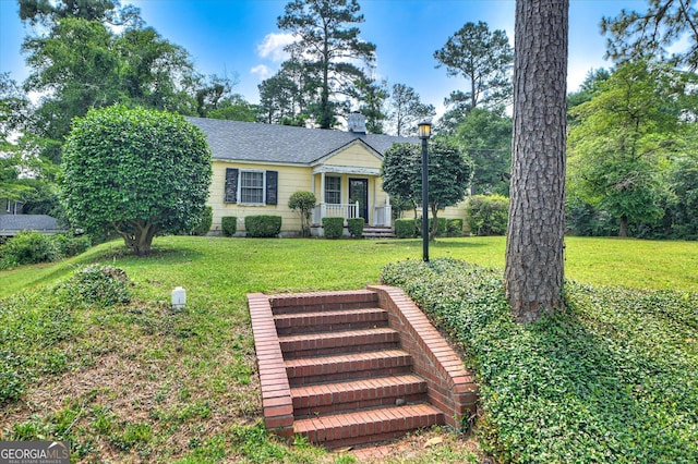 1216 Peachtree Rd, Augusta, GA 30909 - view of front facade with a front yard, a chimney, and roof with shingles