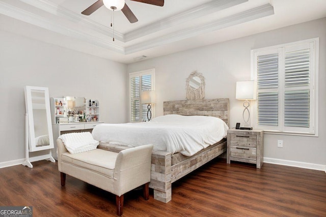 6115 Stella Light Dr, Flowery Branch, GA 30542 - bedroom with ornamental molding, a tray ceiling, wood finished floors, baseboards, and ceiling fan