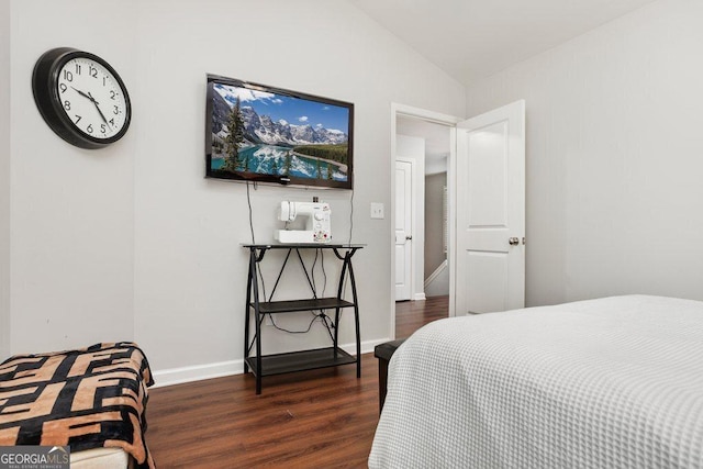 6115 Stella Light Dr, Flowery Branch, GA 30542 - bedroom with wood finished floors, lofted ceiling, and baseboards