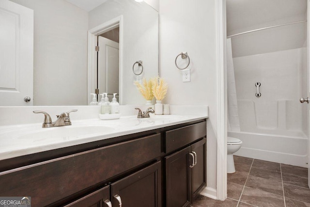 6115 Stella Light Dr, Flowery Branch, GA 30542 - bathroom featuring double vanity, toilet, shower / tub combo with curtain, and tile patterned flooring