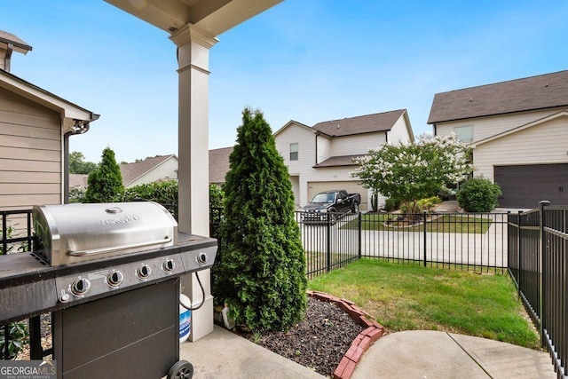 6115 Stella Light Dr, Flowery Branch, GA 30542 - fenced backyard featuring grilling area