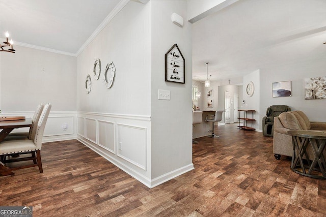 6115 Stella Light Dr, Flowery Branch, GA 30542 - dining room with wood finished floors and crown molding