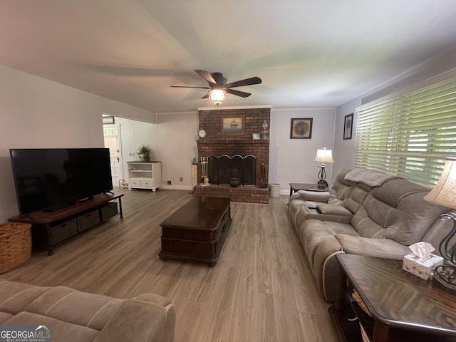 424 Harkins Rd, Cleveland, GA 30528 - living room with a ceiling fan, wood finished floors, a brick fireplace, and baseboards
