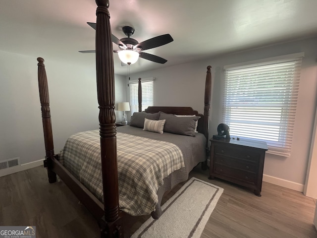 424 Harkins Rd, Cleveland, GA 30528 - bedroom featuring baseboards, wood finished floors, and a ceiling fan
