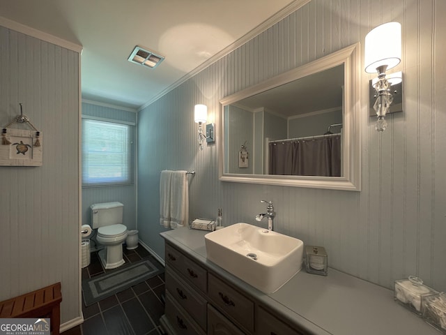 424 Harkins Rd, Cleveland, GA 30528 - full bath with toilet, vanity, ornamental molding, and tile patterned floors
