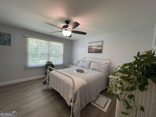 424 Harkins Rd, Cleveland, GA 30528 - bedroom with wood finished floors, baseboards, and ceiling fan