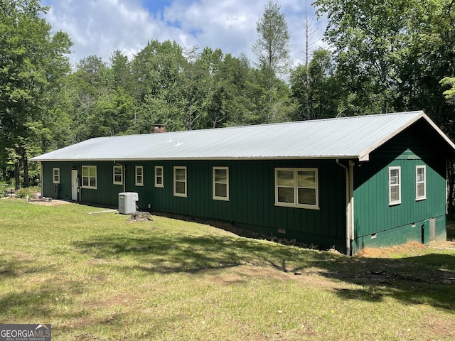 424 Harkins Rd, Cleveland, GA 30528 - view of front of home featuring central AC, a front lawn, crawl space, and metal roof