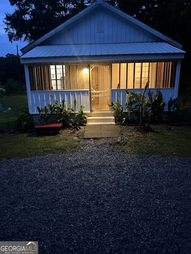 44 Freeman, Heflin, AL 36264 - view of front of property featuring board and batten siding and covered porch