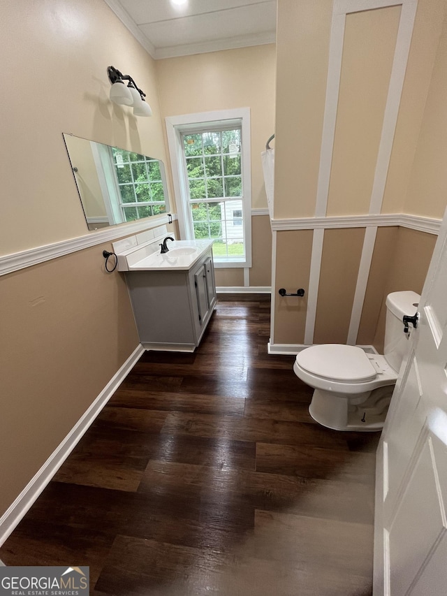 44 Freeman, Heflin, AL 36264 - bathroom featuring wood finished floors, vanity, and crown molding