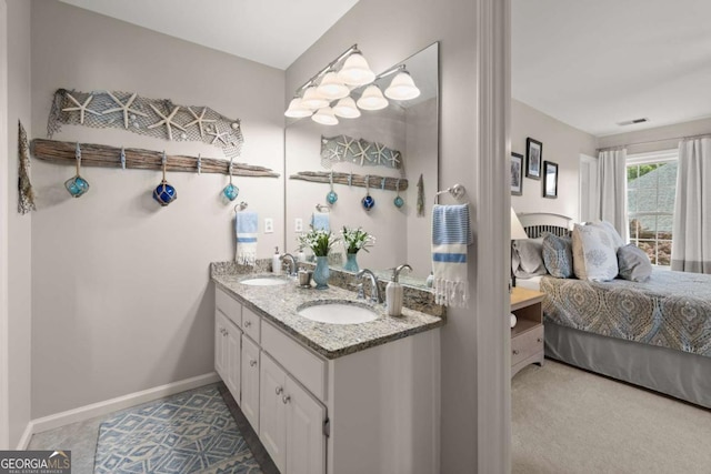 220 Webley Ln, Alpharetta, GA 30022 - ensuite bathroom featuring double vanity and baseboards