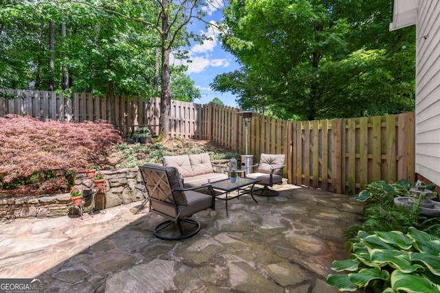 220 Webley Ln, Alpharetta, GA 30022 - fenced backyard featuring an outdoor living space and a patio