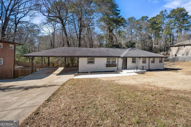 2277 Cloverdale Dr SE, Atlanta, GA 30316 - view of front facade featuring driveway, a carport, and brick siding
