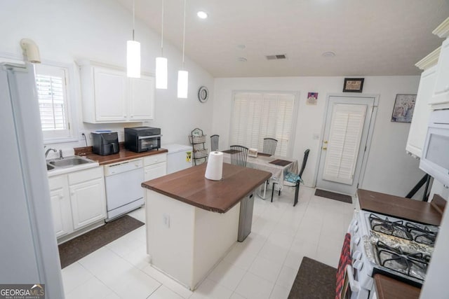 2840 General Lee Way, Buford, GA 30519 - kitchen with white appliances, butcher block counters, white cabinetry, and recessed lighting