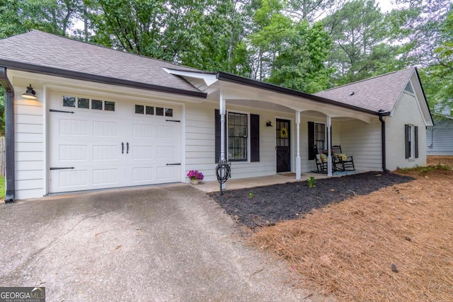 2038 Summertown Dr, Norcross, GA 30071 - single story home with a shingled roof, a porch, driveway, and an attached garage