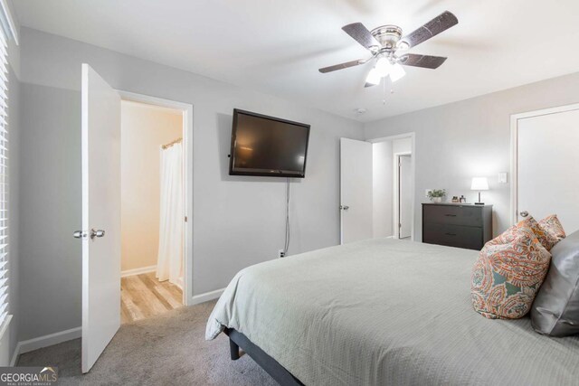 2038 Summertown Dr, Norcross, GA 30071 - carpeted bedroom featuring baseboards and a ceiling fan