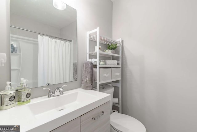 2038 Summertown Dr, Norcross, GA 30071 - bathroom with vanity, toilet, and curtained shower