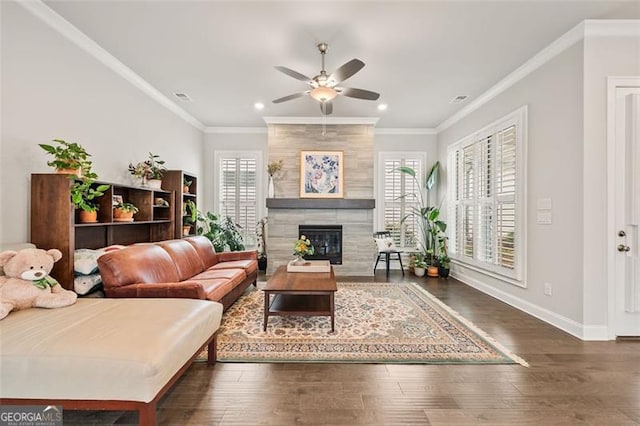 993 Harvest Park Ln, Suwanee, GA 30024 - living area with healthy amount of natural light, a ceiling fan, recessed lighting, wood finished floors, and ornamental molding