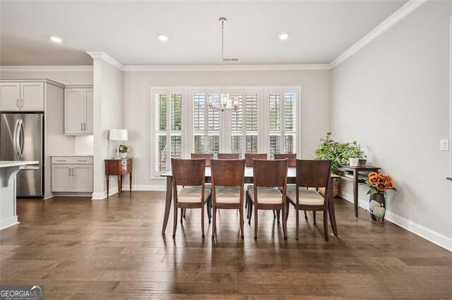 993 Harvest Park Ln, Suwanee, GA 30024 - dining space with a chandelier, crown molding, dark wood-style floors, and recessed lighting