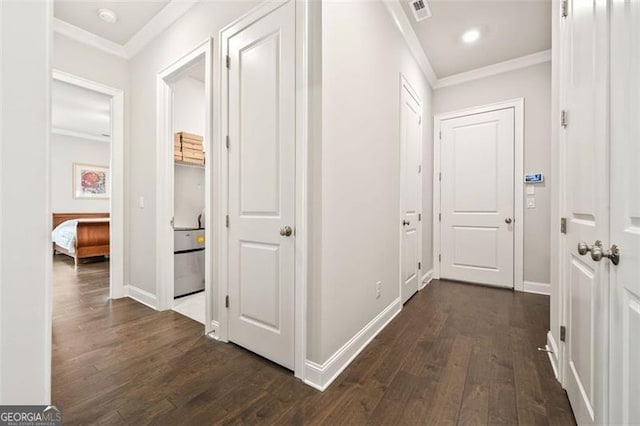 993 Harvest Park Ln, Suwanee, GA 30024 - hallway with ornamental molding, dark wood finished floors, and recessed lighting