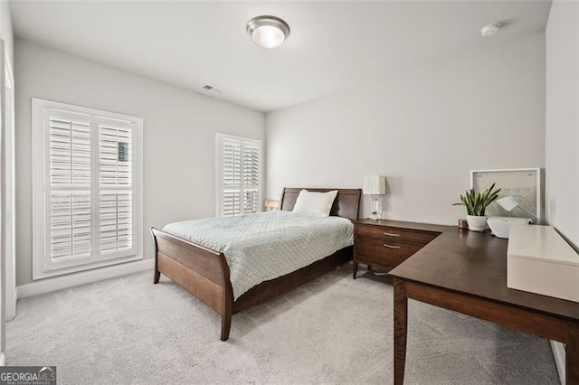 993 Harvest Park Ln, Suwanee, GA 30024 - bedroom with light colored carpet and an office area