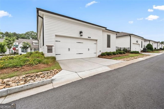 993 Harvest Park Ln, Suwanee, GA 30024 - view of front of house with an attached garage and concrete driveway