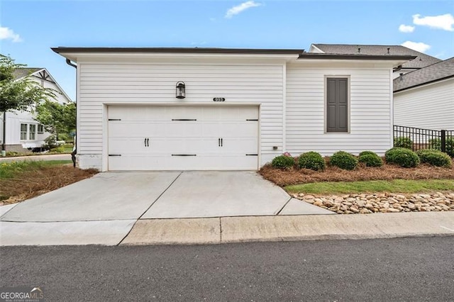 993 Harvest Park Ln, Suwanee, GA 30024 - view of front of home featuring driveway and an attached garage