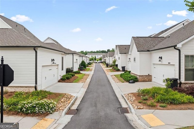 993 Harvest Park Ln, Suwanee, GA 30024 - view of asphalt road with a residential view