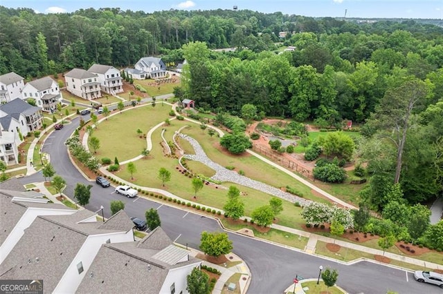 993 Harvest Park Ln, Suwanee, GA 30024 - aerial view of residential area with a heavily wooded area