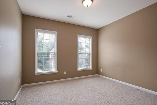 12194 Limeridge Ct, Alpharetta, GA 30004 - carpeted spare room with baseboards