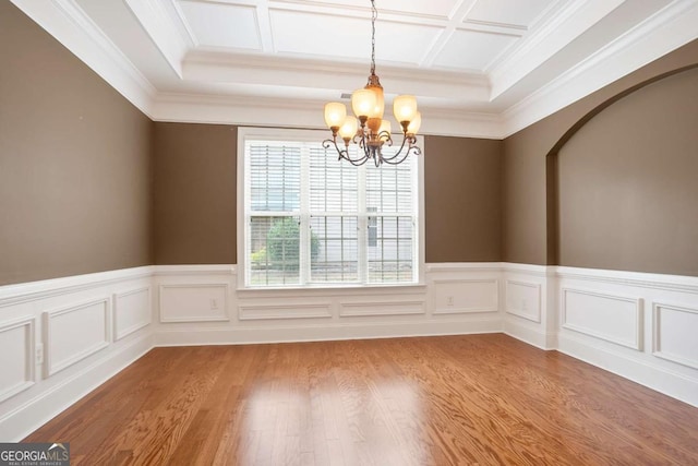 12194 Limeridge Ct, Alpharetta, GA 30004 - unfurnished dining area with a chandelier, ornamental molding, light wood-style floors, wainscoting, and coffered ceiling