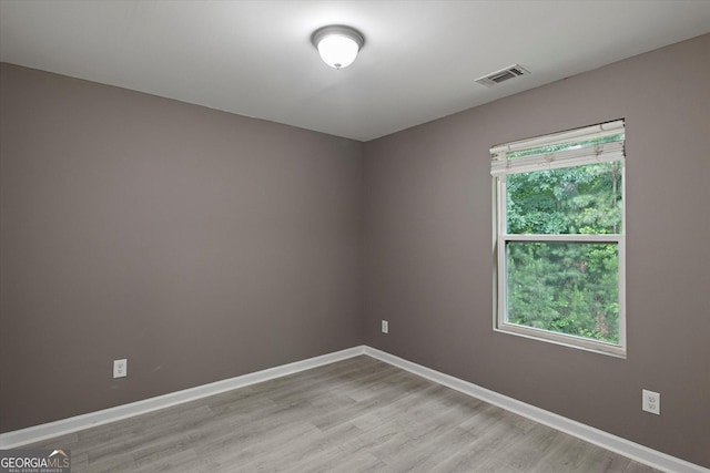 2137 Chadwick Rd SW, Atlanta, GA 30331 - empty room with light wood-style flooring and baseboards