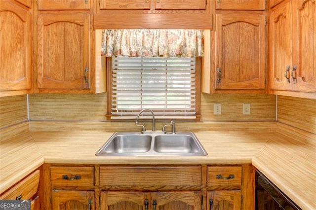 402 Princeton Way, Lawrenceville, GA 30044 - kitchen with light countertops, brown cabinetry, and backsplash