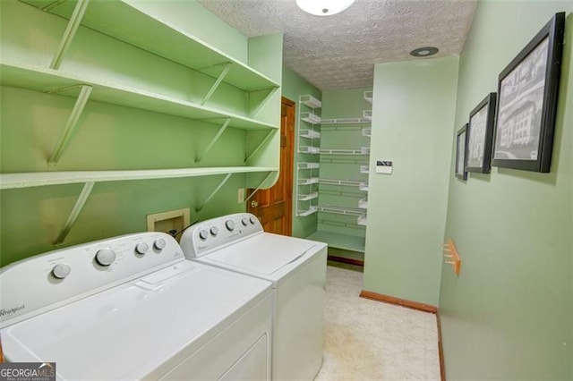 402 Princeton Way, Lawrenceville, GA 30044 - washroom featuring separate washer and dryer and a textured ceiling