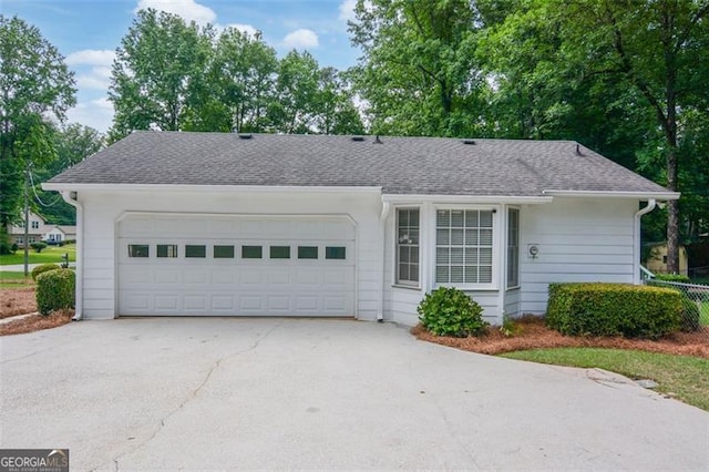 402 Princeton Way, Lawrenceville, GA 30044 - single story home with driveway, a garage, and roof with shingles