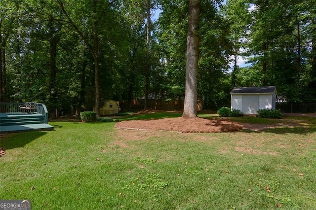 402 Princeton Way, Lawrenceville, GA 30044 - view of grassy yard with a shed