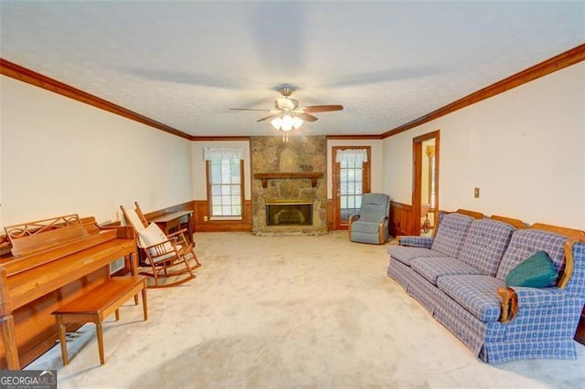 402 Princeton Way, Lawrenceville, GA 30044 - living room featuring a ceiling fan, carpet floors, a fireplace, and crown molding