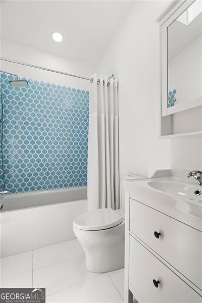 1492 Sagewood Cir, Stone Mountain, GA 30083 - full bathroom with vanity, shower / tub combo, and tile patterned floors