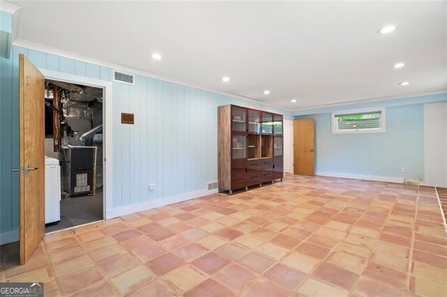 1492 Sagewood Cir, Stone Mountain, GA 30083 - spare room with crown molding, recessed lighting, and washer / clothes dryer